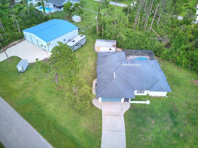 House w/2 car garage and 3 car garage/mancave on 3 lots