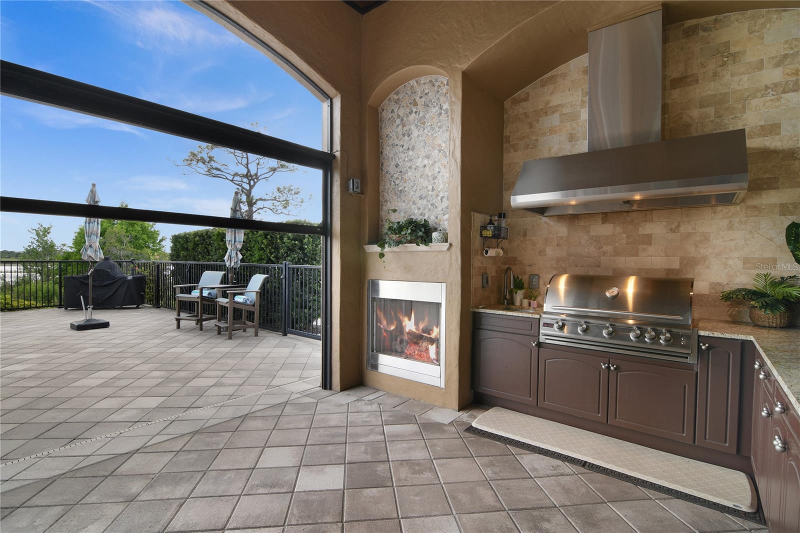 Retractable screen to huge pool area from covered lanai.