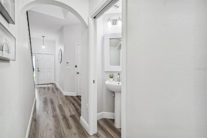 The half bathroom is conveniently located downstairs.