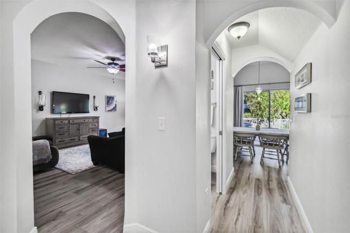 Family room, half bathroom and breakfast area