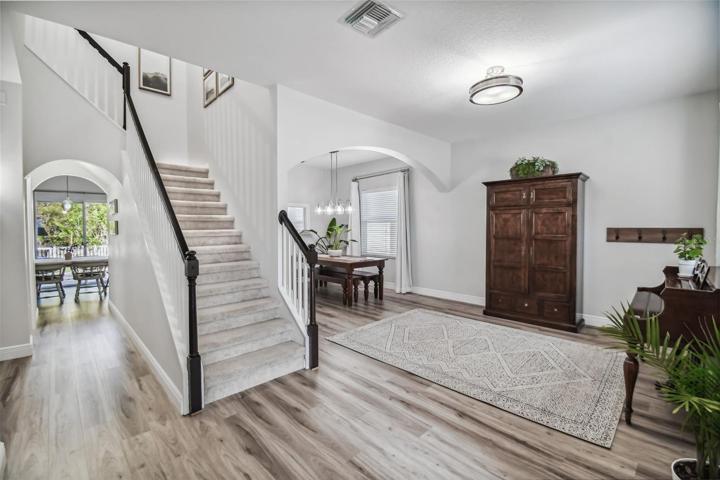 Foyer to living room and dining room.