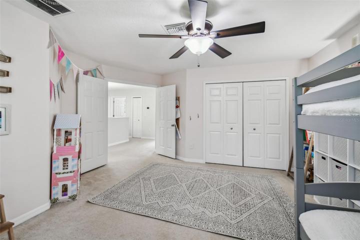 The second bedroom double doors are a welcome design touch.