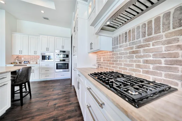 Propane Gas Cooktop - Brickette backsplash