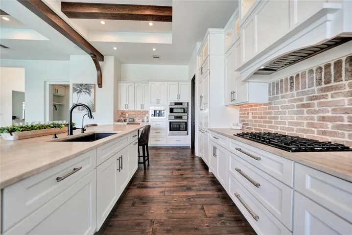 Custom Kitchen - Quartzite Counter - Tops - Propane Gas Cook Top - brickette backsplash