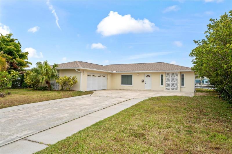 You'll love the extra parking pad! And 2 car garage!