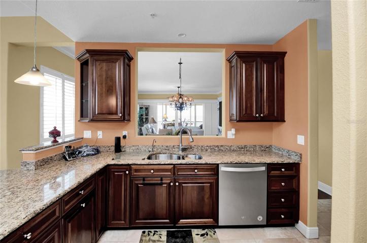 Imagine enjoying the Harbor/Bay view while prepping in your upgraded kitchen, complete with pull-out drawers and storage