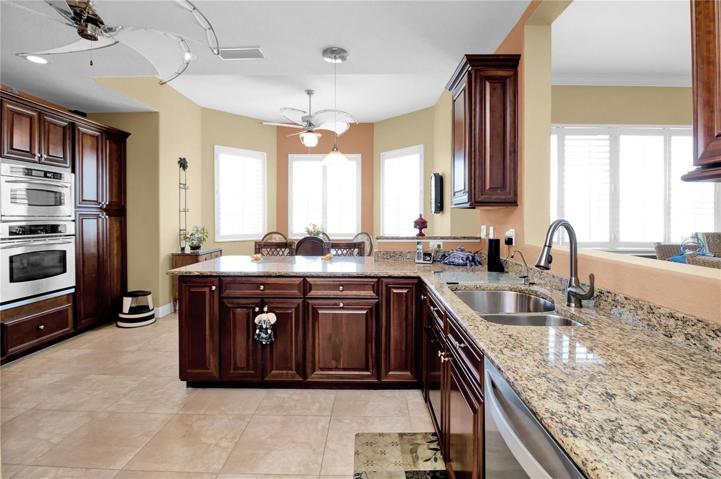Chef's dream kitchen with separate breakfast nook and bay window overlooking Harbor