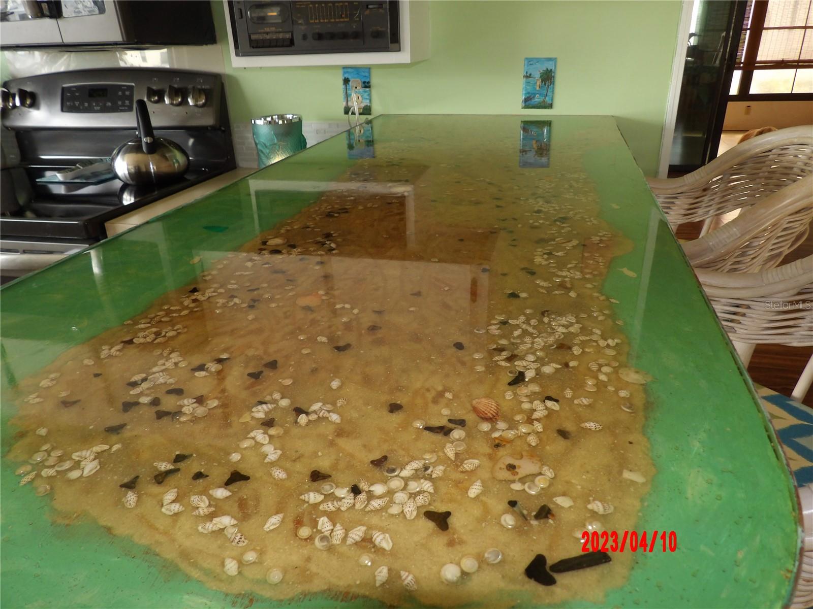 The amount of artwork designing this breakfast bar top is amazing