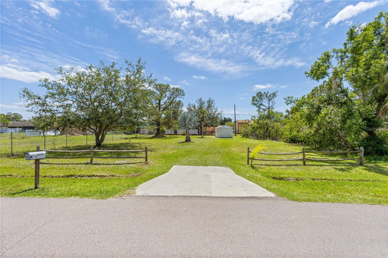 BACK LOT WITH SEARATE ACCESS FROM BACK OF HOME