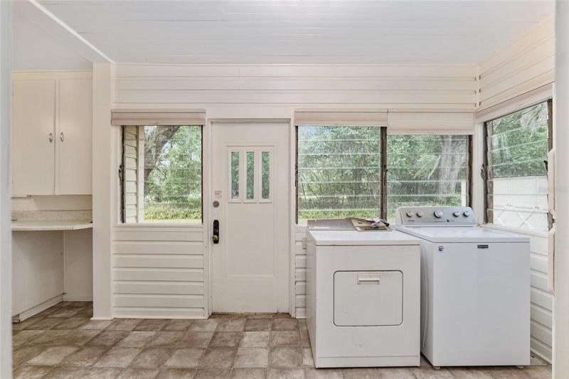 Laundry and door to patio
