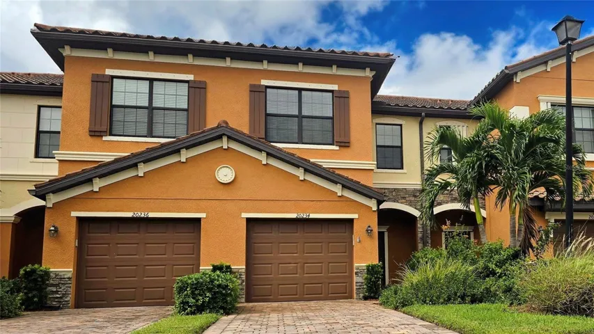 Front of home, unit is on the right