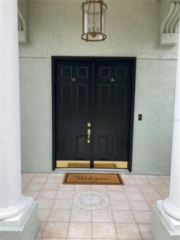 Tiled grand entrance.Large double front doors