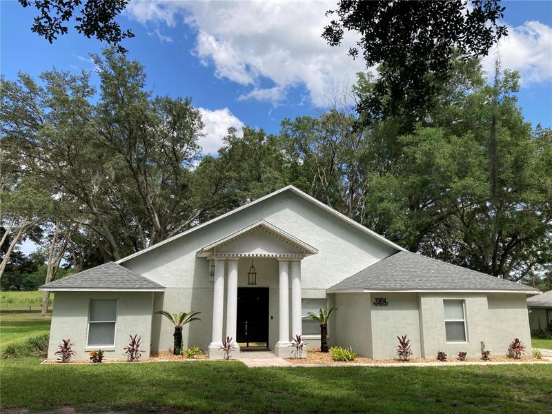 Front of house with new roof