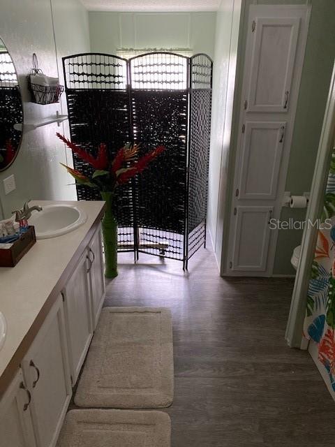 Master Bath - behind the screen is where you can put a bathtub as the hook ups are there (currently hidden behind wall but they are there) 