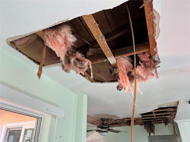 8101 Hixton Dr dining area detail of ceiling damage