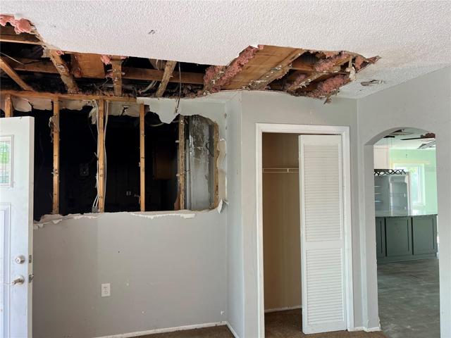 8101 Hixton Dr living room wall damage