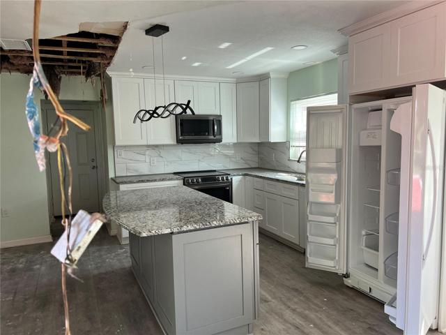 8101 Hixton Dr kitchen area from dining