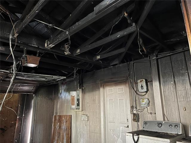 8101 Hixton Dr garage interior after fire