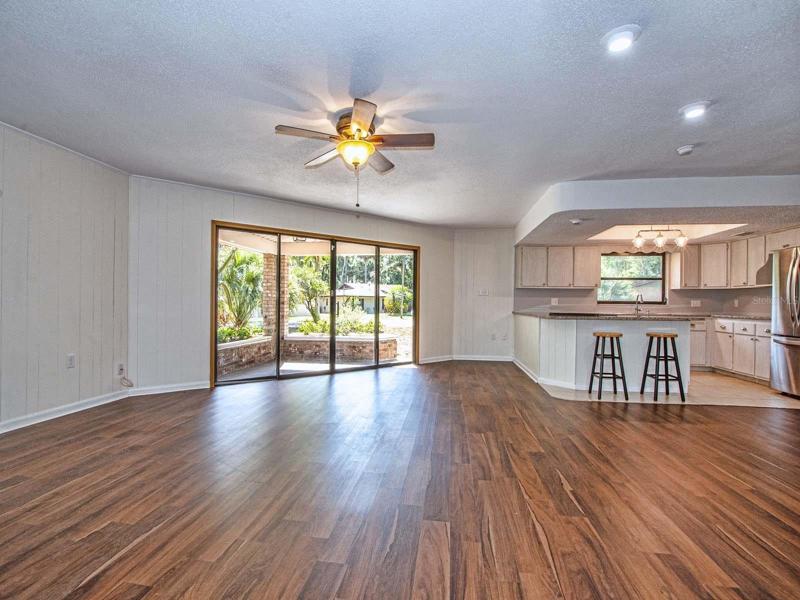 View back to entry door & kitchen