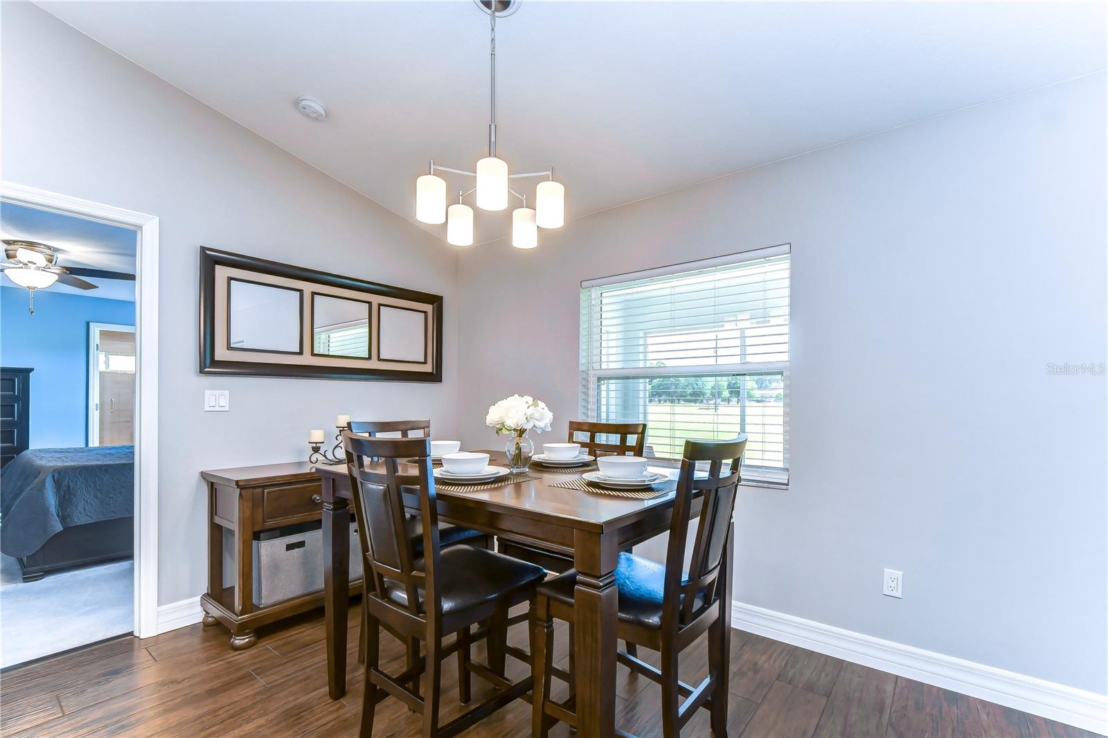 Cozy breakfast nook features a large window offering breathtaking views to enjoy while sipping your morning coffee!