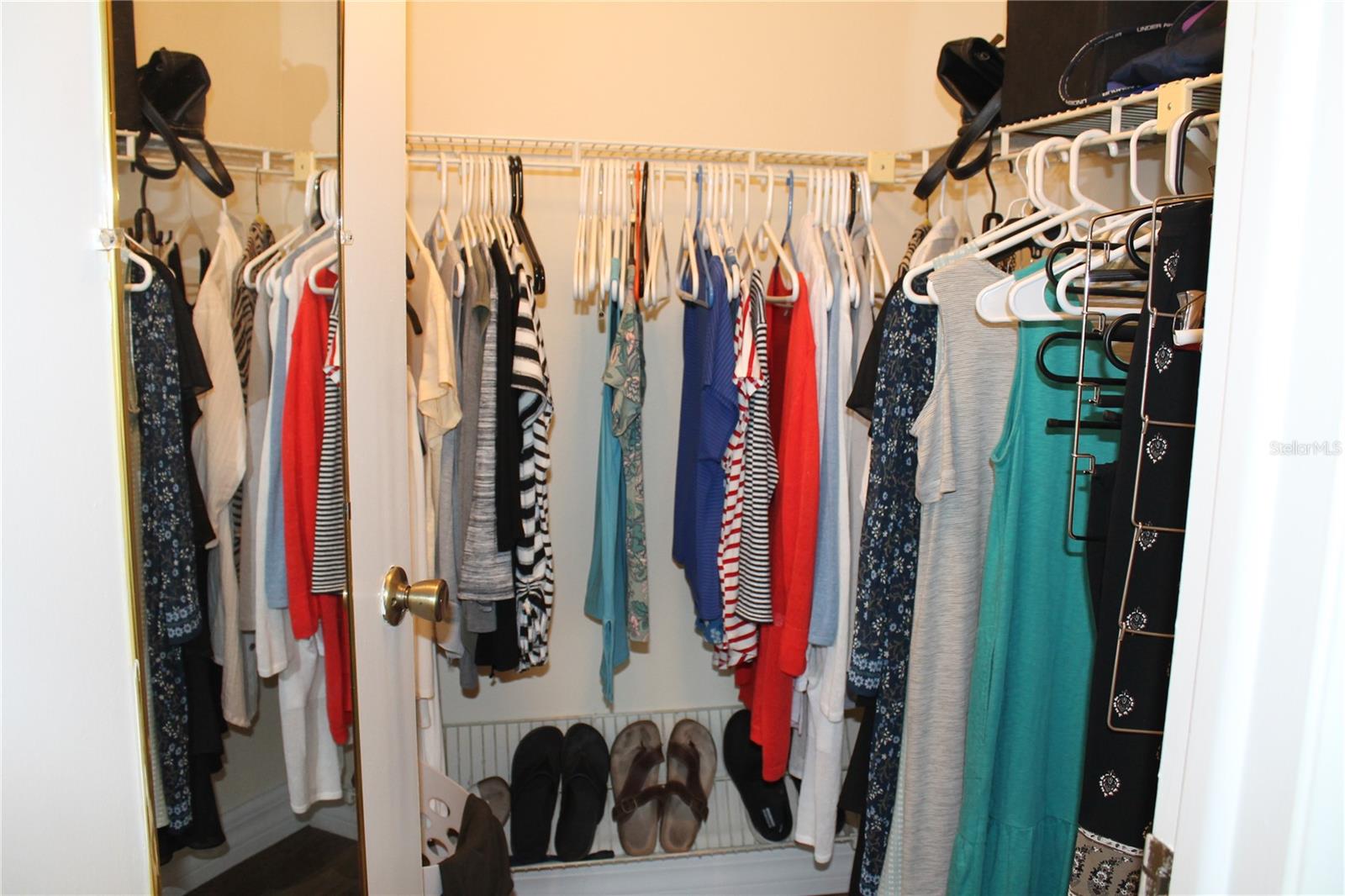 Walk-In Closet In Master Bedroom.