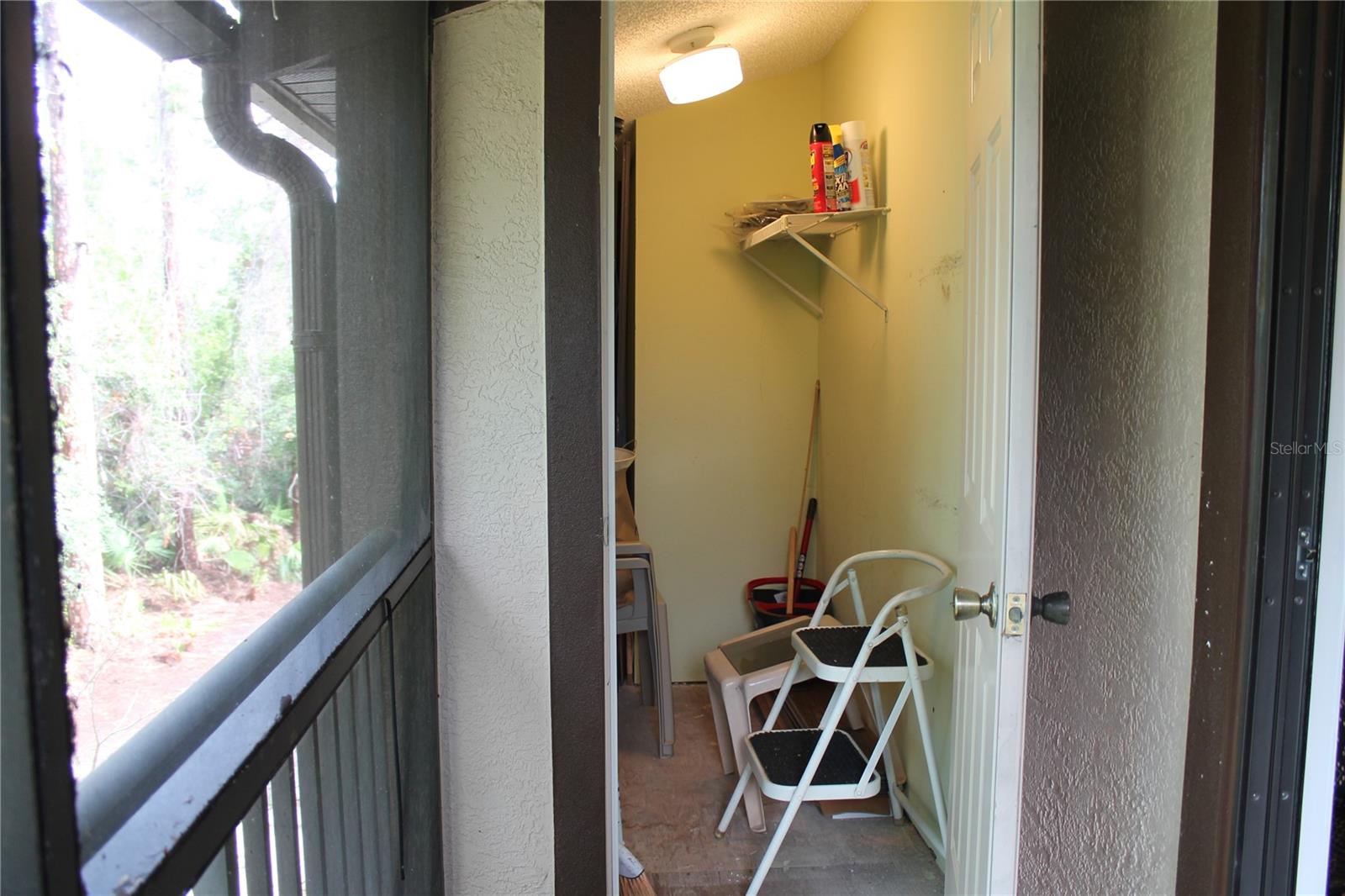Screened Balcony With Wooded View And Storage Room.