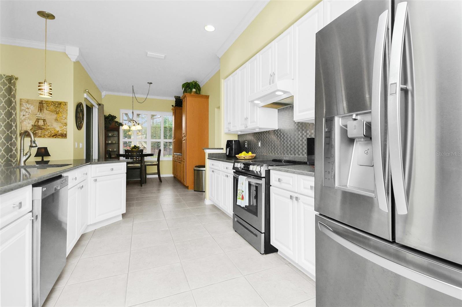 Kitchen with stainless steel appliances & Quartz work tops