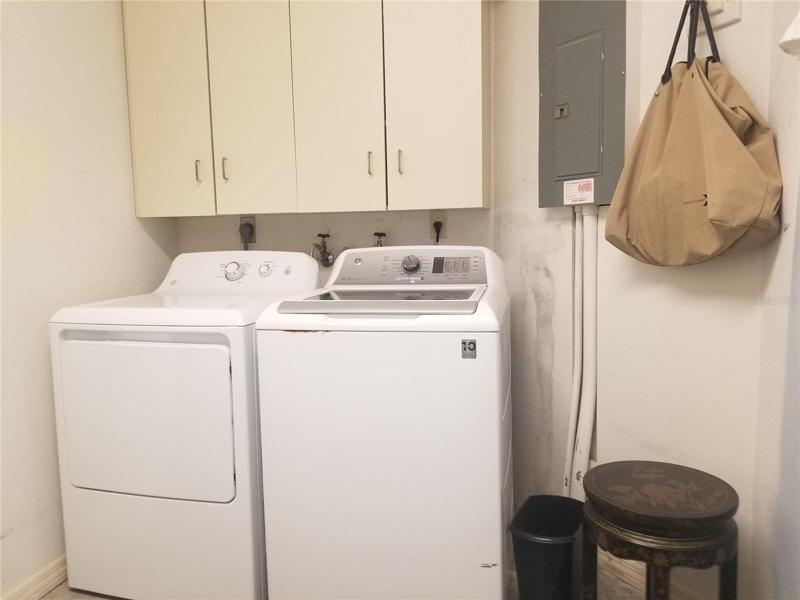 Laundry room within garage