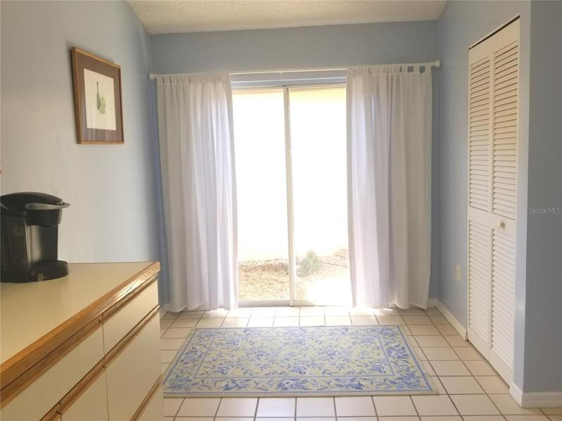 Kitchen opens to the private courtyard. Pantry Closet.