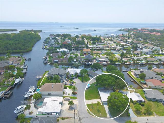 Welcome to this WATERFRONT home in the sought-after Baywood Village community in Palm Harbor!