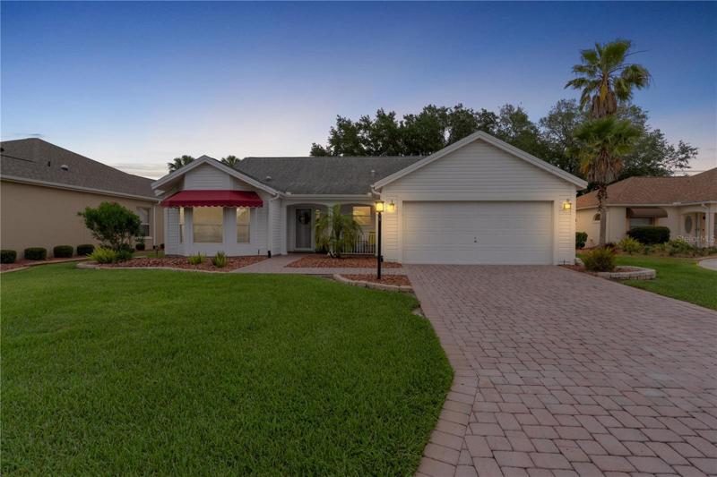 TWILIGHT VIEW OF YOUR HOME.