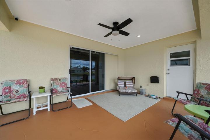 Covered lanai with family room pocket sliding glass door and lanai bath