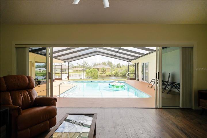 Open up the wall of glass doors to entertain inside and out!