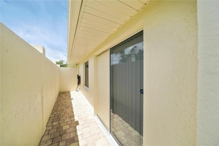 Private patio from primary bonus room