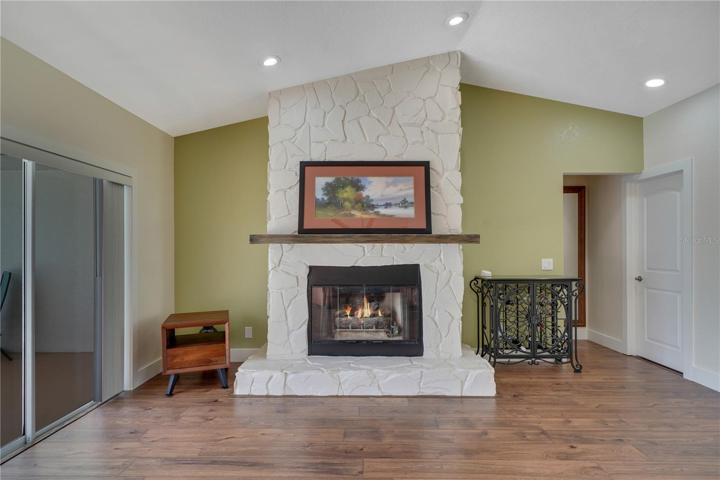 stone gas fireplace with mantel