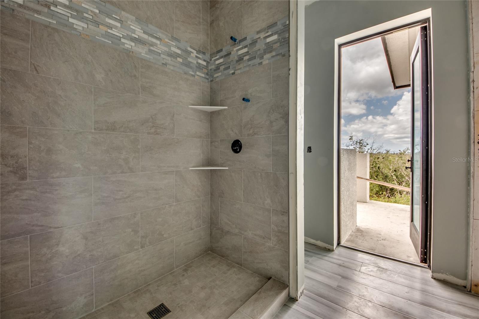 Close up of pool and guest shower - easy access to the outside!