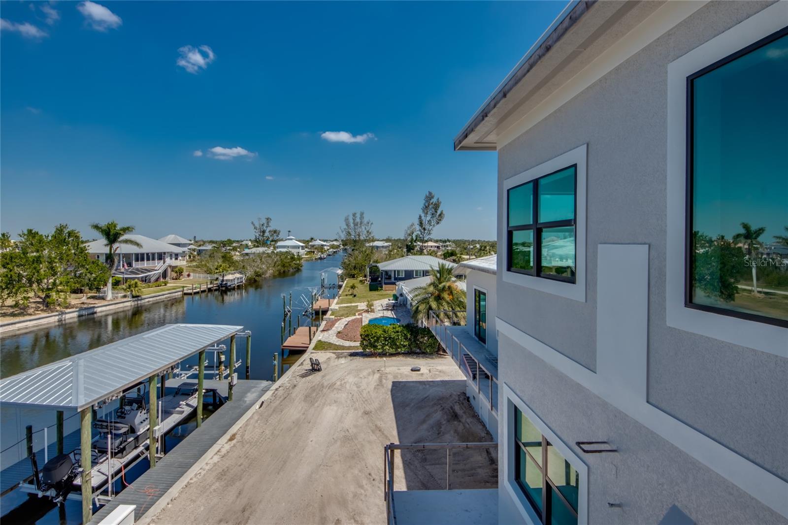 View looking east down the canal - Pirate Harbor is a one of a kind location between Punta Gorda and Cape Coral with easy access to both ,cities.  Pirate Harbor was a long kept secret with deep canals and water access!  
