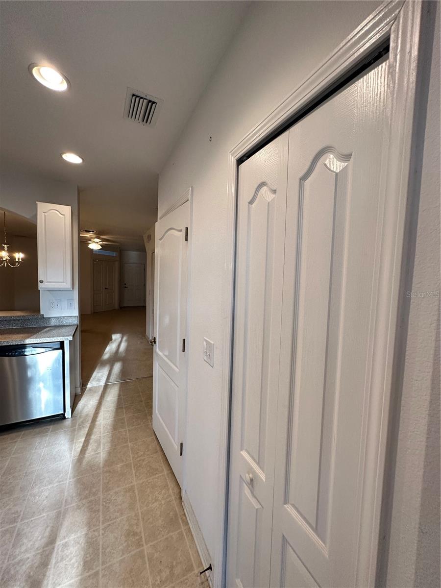 Kitchen w/ Storage Closet &amp; Half Bath