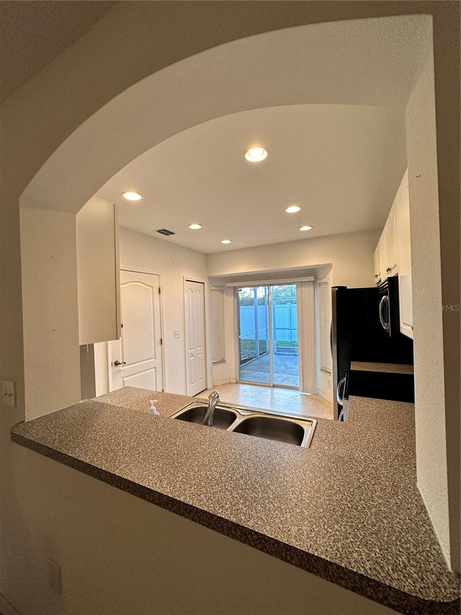 Pass Through Dining Room to Kitchen