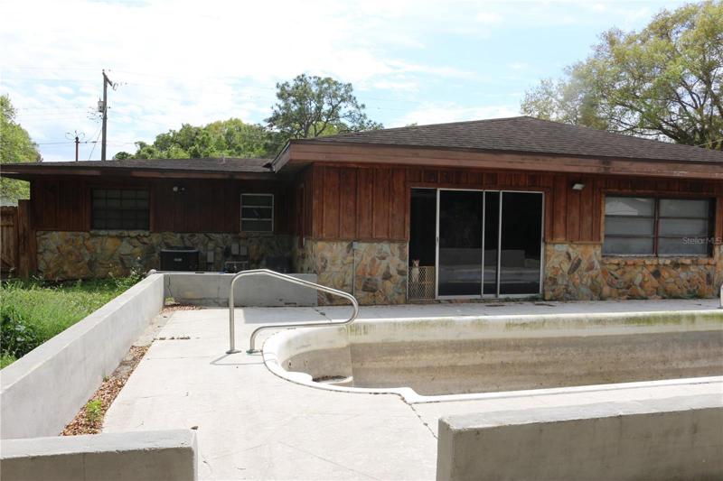 Rear of property with inground pool