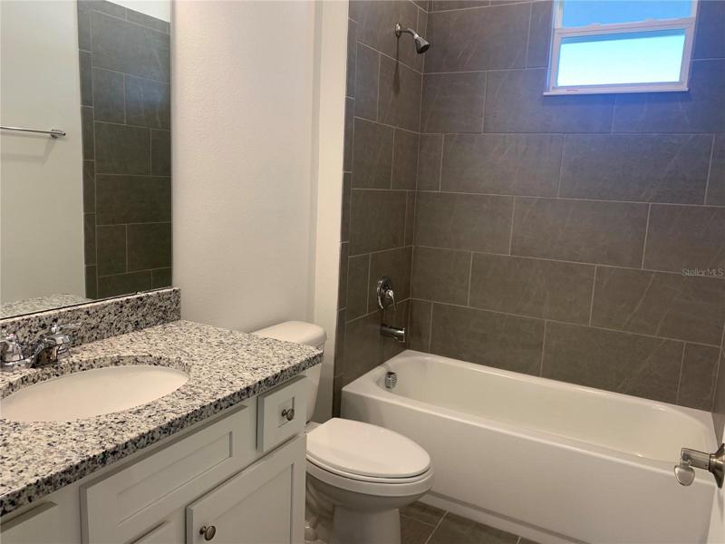 Internal photos are of same model, different home.  This home has similar finishings.