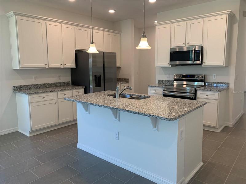 Internal photos are of same model, different home.  This home has similar finishings.