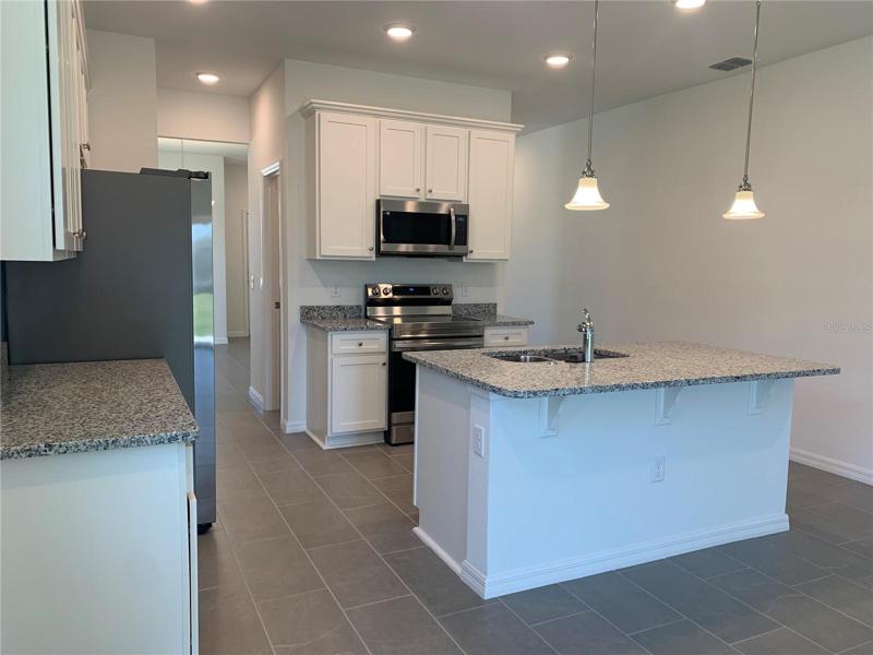 Internal photos are of same model, different home.  This home has similar finishings.
