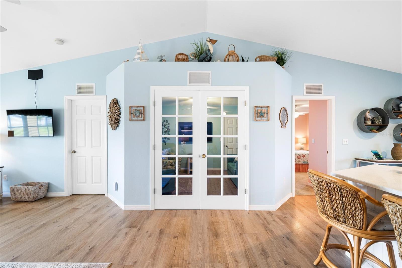 French doors leading to the den from the living room