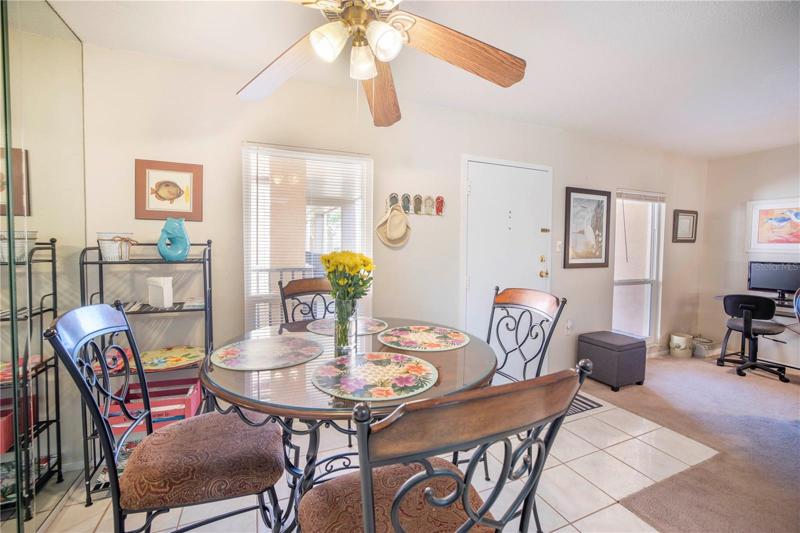 Dining area off of kitchen- see the beautiful blue waters from your dining room table.