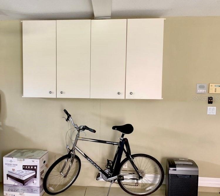 Garage side door and garage A/C unit