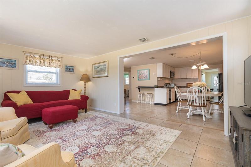 Living room open to kitchen & dining