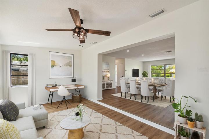 Virtually staged. Office/den/loung area
