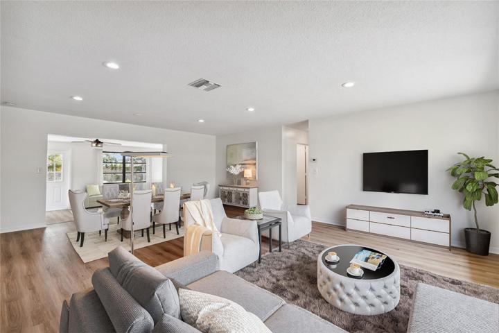 Virtually staged. Living/dining room