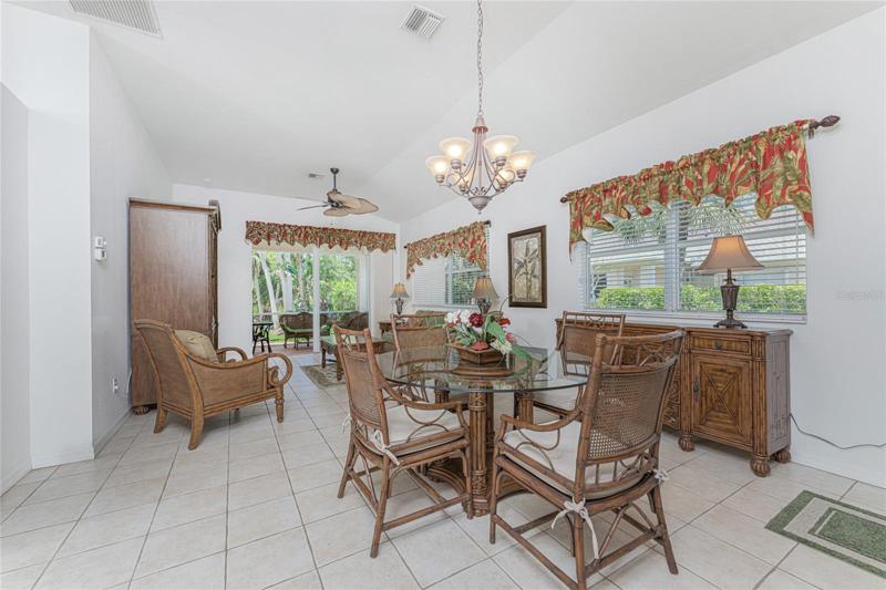 Dining room with vaulted ceiling